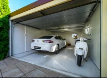 Garden house with Hormann safety garage door