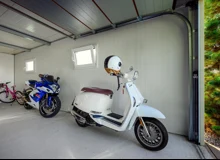 Garden house with Hormann safety garage door