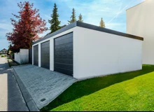 Garden house with Hormann safety garage door