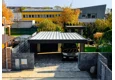 Garden house with Hormann safety garage door