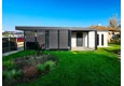 Garden house with Hormann safety garage door