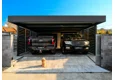 Garden house with Hormann safety garage door