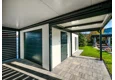 Garden house with Hormann safety garage door