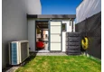 Garden house with Hormann safety garage door