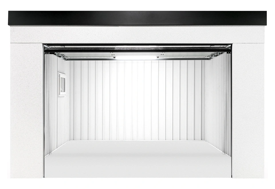 Garden house with Hormann safety garage door