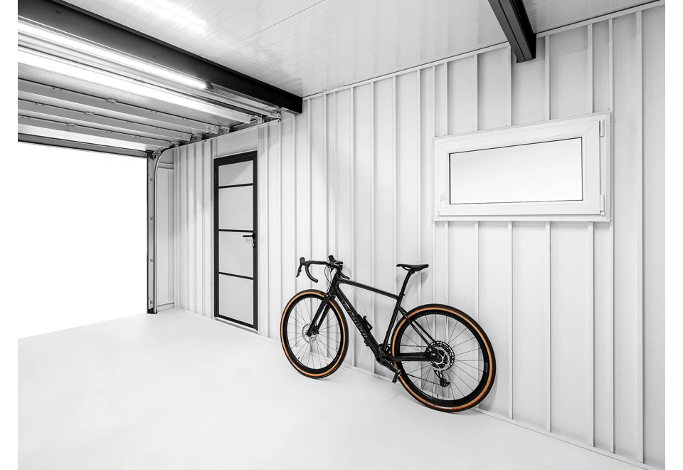 Garden house with Hormann safety garage door