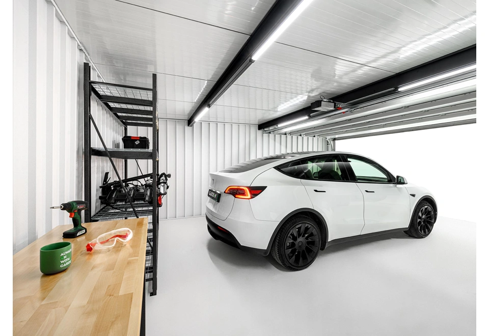 Garden house with Hormann safety garage door