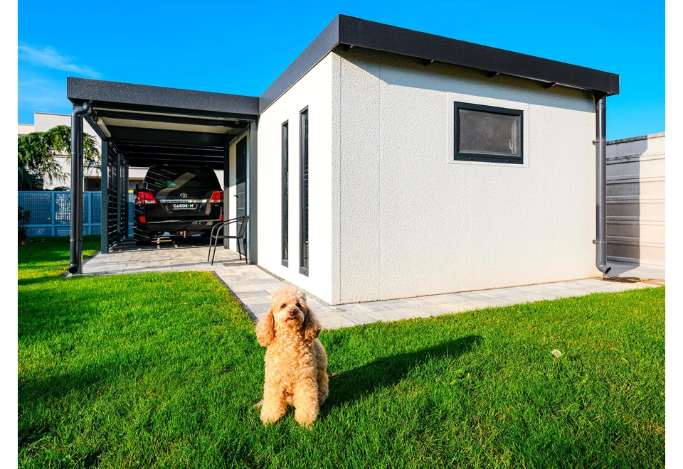 Garden house with Hormann safety garage door