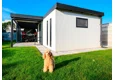 Garden house with Hormann safety garage door