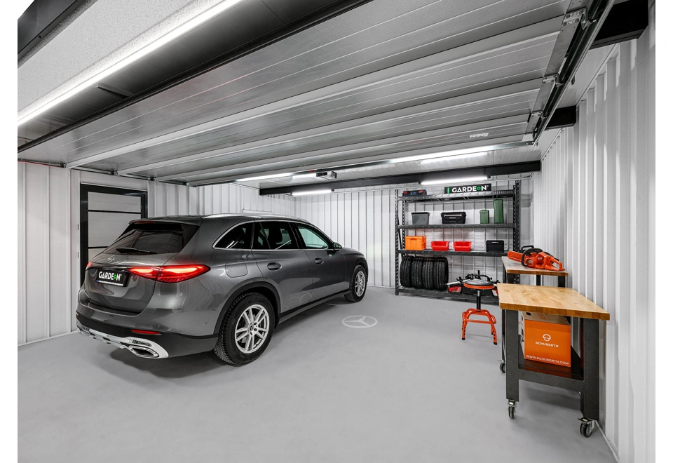 Garden house with Hormann safety garage door