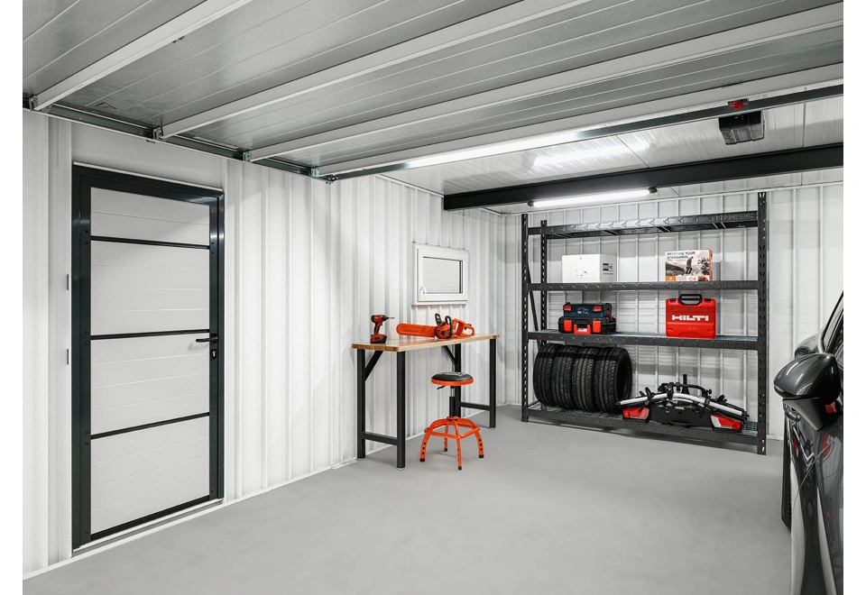 Garden house with Hormann safety garage door