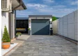 Garden house with Hormann safety garage door