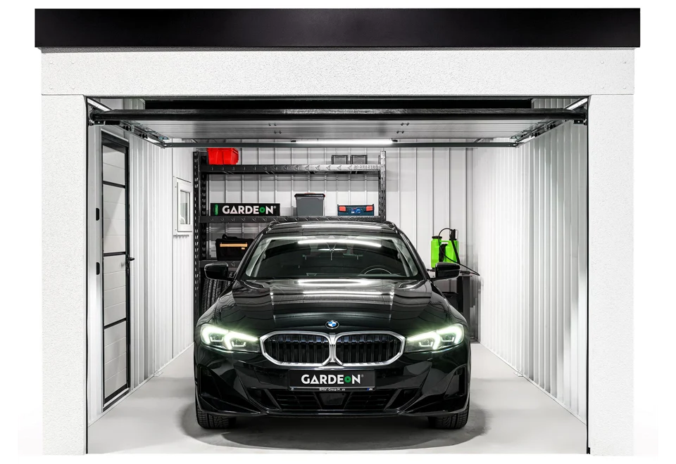 Garden house with Hormann safety garage door