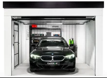 Garden house with Hormann safety garage door