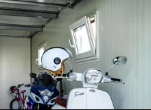 Garden house with Hormann safety garage door