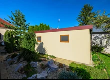 Garden house with Hormann safety garage door