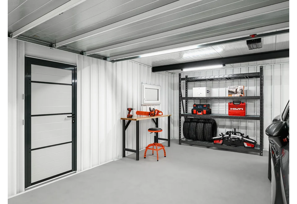 Garden house with Hormann safety garage door