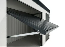 Garden house with Hormann safety door and garage door