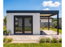 Garden house with double panoramatic door and carport