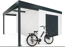 Garden house with Hormann garage door and left carport