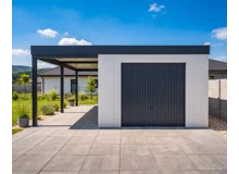 Garden house with Hormann garage door and left carport