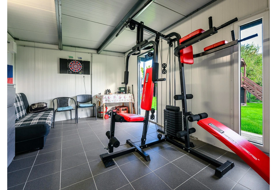 Garden house with Hormann safety garage door