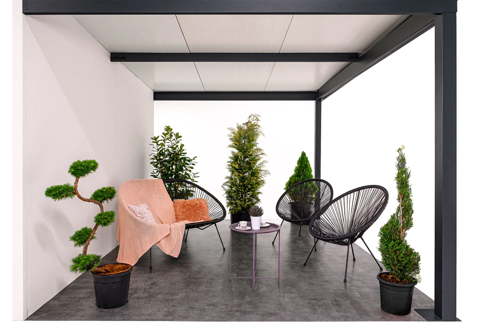 Garden house with Hormann garage door and carport