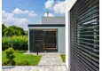 Garden house with Hormann safety garage door