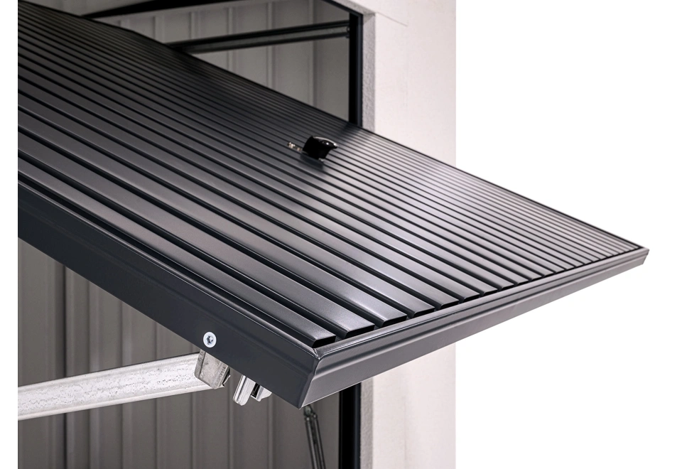 Garden house with Hormann safety garage door