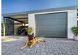 Garden house with Hormann safety garage door